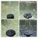Solar fountain creating decorative water feature in outdoor pond for bird watching
