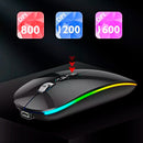 Dual mode wireless mouse side view showing ergonomic design