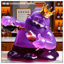 Mutant Amoeba King demonstrating professional wine tasting process with aerator