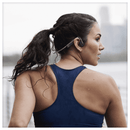 OpenMove S661 in White worn during outdoor sport activity — open-ear awareness in action